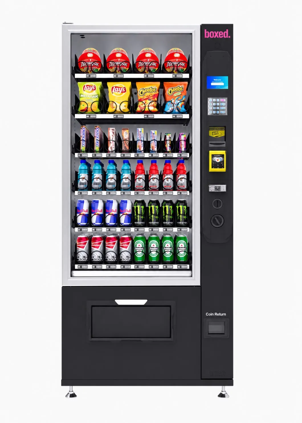 boxed. Getränke- und Snackautomat von vorn, schmaleres Gehäuse: Instantnudelbecher, Chips, Riegel, Sportgetränke sowie Energy- und Bierdosen auf sechs Ebenen.